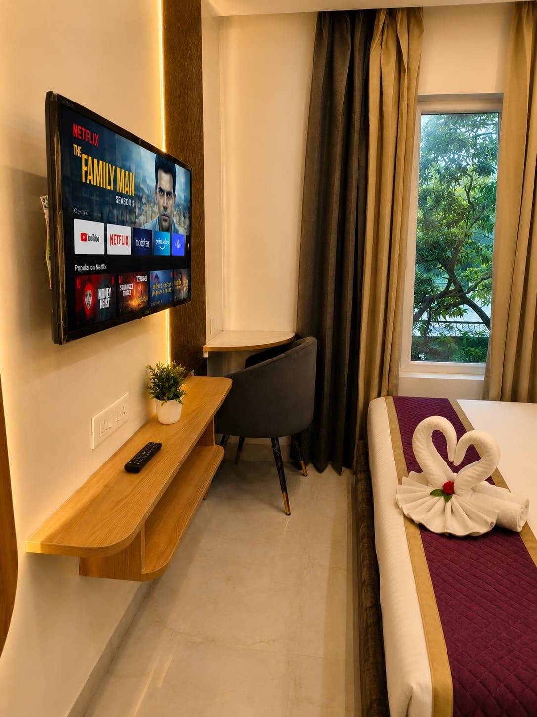 Deluxe Room work desk and television